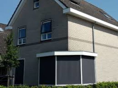 Een gezellige en comfortabele sfeer in huis dankzij een uitvalscherm in Montfoort